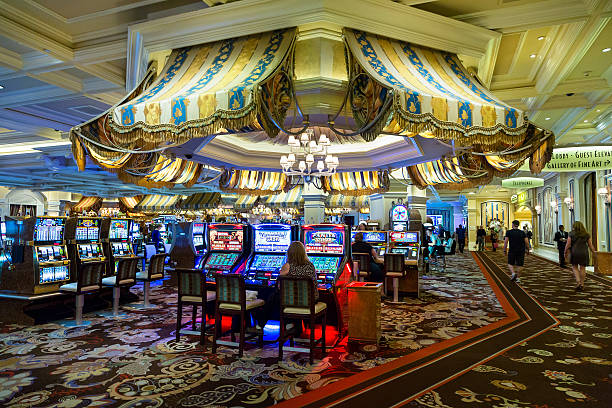 kudamas88 Hongkong Pools live-dealer studio with professional lighting and multiple tables